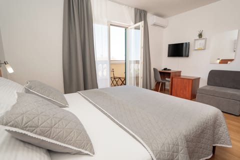 Standard Double Room, Balcony | Down comforters, minibar, in-room safe, desk