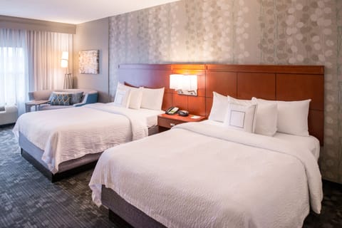 Desk, laptop workspace, blackout drapes, iron/ironing board