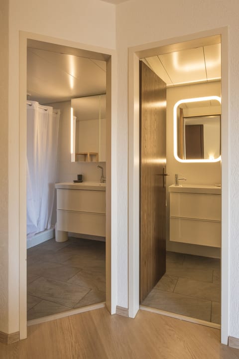 Family Suite, 1 Queen Bed with Sofa bed, Lake View | Bathroom | Shower, hair dryer, bathrobes, slippers