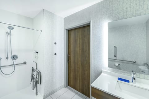 Suite, 1 King Bed, Accessible (Mobility, Roll-In Shower) | Hypo-allergenic bedding, desk, laptop workspace, blackout drapes