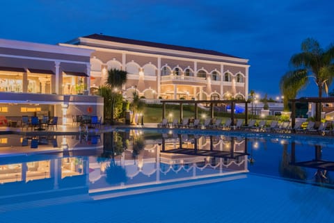Indoor pool, outdoor pool, open 9:00 AM to 9:00 PM, pool umbrellas