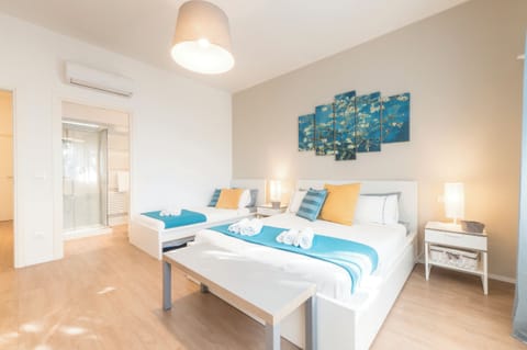 Superior Triple Room, Ensuite, Garden View (Acqua) | Premium bedding, down comforters, minibar, iron/ironing board