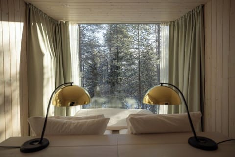 Arctic Treehouse Suite Double and View | Premium bedding, minibar, in-room safe, blackout drapes