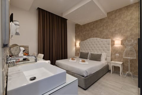 Superior Double or Twin Room | Minibar, in-room safe, blackout drapes, iron/ironing board