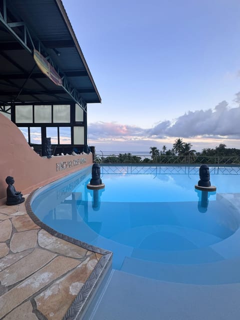 Outdoor pool, open 8:30 AM to 7:00 PM, pool umbrellas, sun loungers