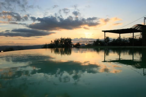 Outdoor pool, open 8:30 AM to 6:00 PM, pool umbrellas, sun loungers