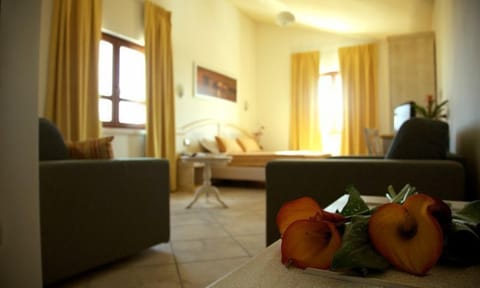 Superior Double Room | Living area | Flat-screen TV