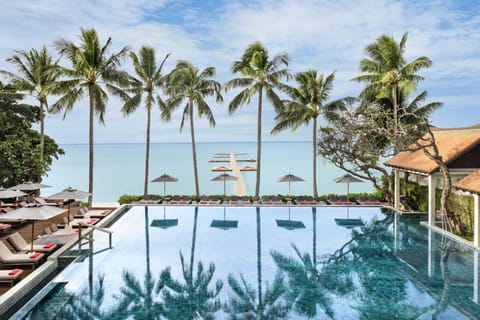 Outdoor pool, open 7:00 AM to 7:00 PM, pool umbrellas, sun loungers
