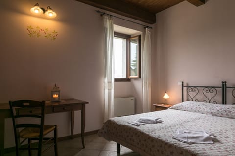 Quadruple Room, Hill View (Lampone) | Individually decorated, desk, bed sheets