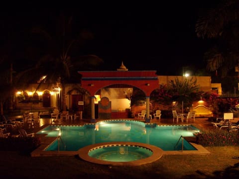Outdoor pool, open 8 AM to 9 PM, pool umbrellas, sun loungers
