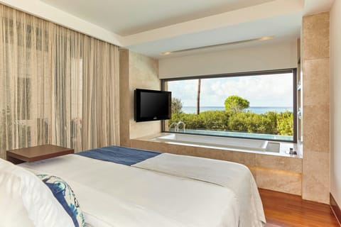 Premium Grand Infinity Suite, 1 Bedroom, Non Smoking, Sea front | Minibar, in-room safe, desk, blackout drapes