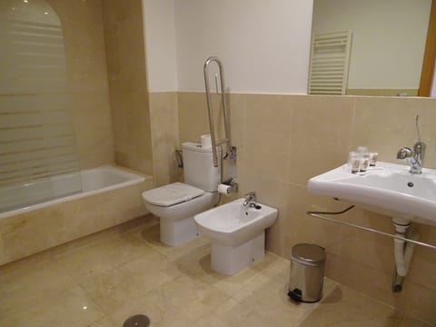 Basic Triple Room, 1 Bedroom, Accessible, Partial Sea View | Bathroom | Bathtub, free toiletries, hair dryer, bidet