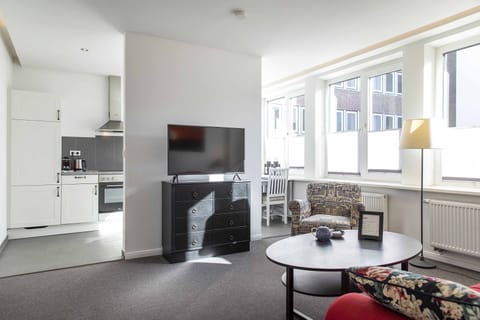 Flat-screen TV, iPod dock