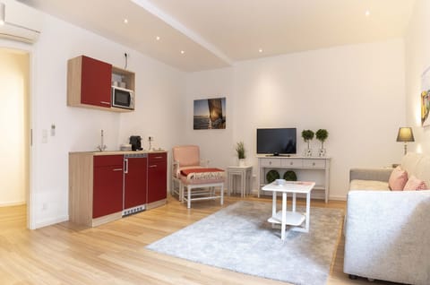 Apartment, 2 Bedrooms | Living area | Flat-screen TV, iPod dock