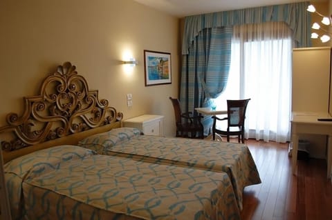 Junior Suite Orchidea | Hypo-allergenic bedding, minibar, in-room safe, desk