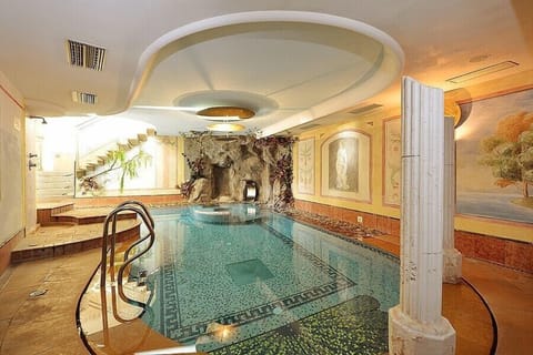 Indoor pool, open 2:30 PM to 7:30 PM, sun loungers