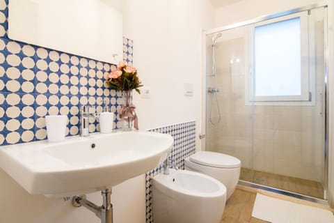 Apartment, 1 Bedroom, Garden View (Sale e Pepe) | Bathroom | Shower, hair dryer, bathrobes, slippers