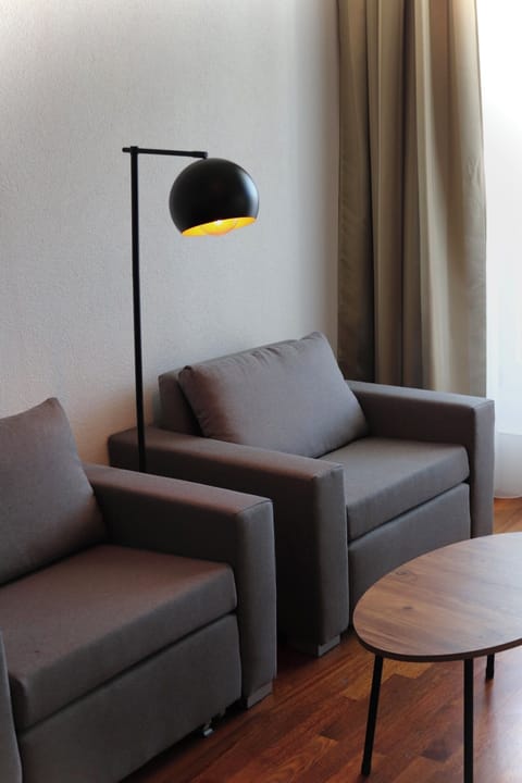 Junior Suite | Living area | Flat-screen TV