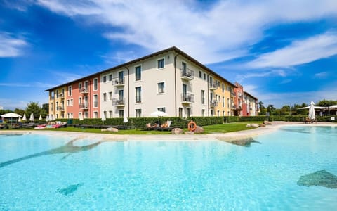 Seasonal outdoor pool, pool umbrellas, sun loungers