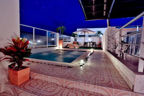 Outdoor pool, open 8 AM to 8 PM, sun loungers