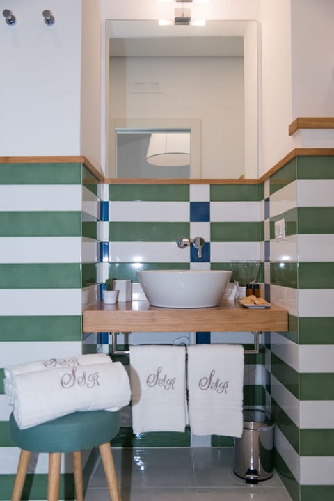 Shower, rainfall showerhead, eco-friendly toiletries, hair dryer