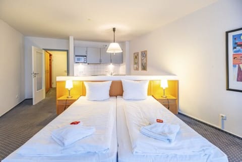 Family Apartment | Living area | Flat-screen TV