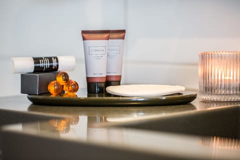 Deep soaking tub, rainfall showerhead, free toiletries, hair dryer