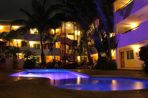 Outdoor pool, open 8:00 AM to 9:00 PM, pool umbrellas, sun loungers