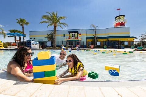 Outdoor pool, open 9:00 AM to 9:00 PM, pool umbrellas, sun loungers