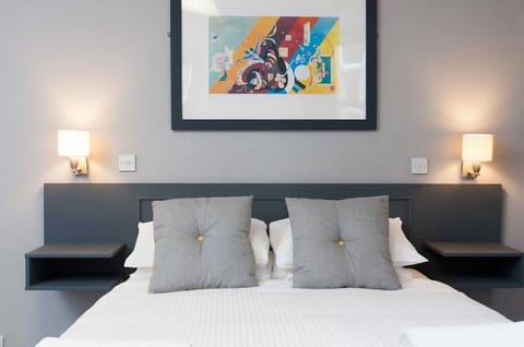 Laptop workspace, iron/ironing board, free WiFi, bed sheets