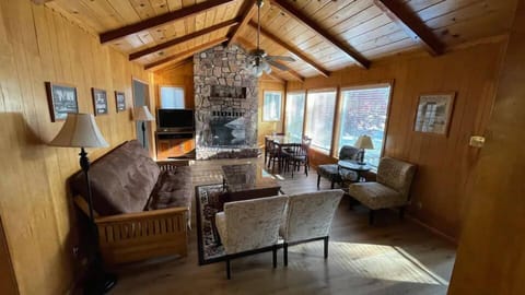 Deluxe Room, Multiple Beds | Living area | 42-inch flat-screen TV with satellite channels, TV