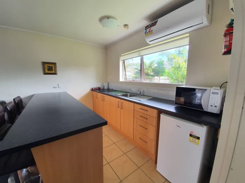 Family Room, 1 Bedroom | Private kitchen | Fridge, microwave, coffee/tea maker, electric kettle