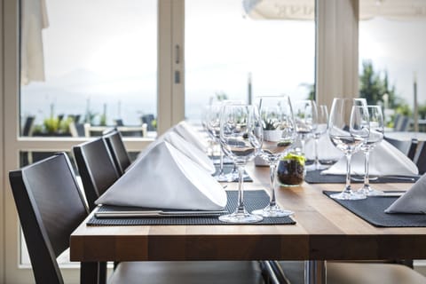 Breakfast, lunch, dinner served; Regional cuisine, garden views 