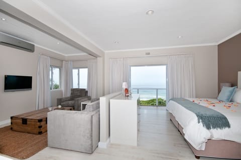 Family Room, 1 King Bed with Sofa bed | 1 bedroom, premium bedding, minibar, in-room safe