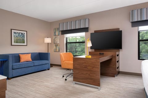 King studio sofabed | Premium bedding, desk, laptop workspace, blackout drapes