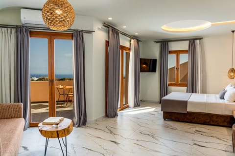 Luxury Double Room | Living area | Flat-screen TV