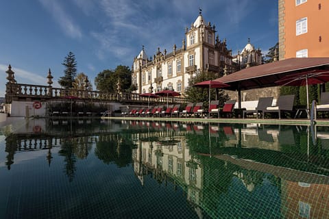 Indoor pool, outdoor pool, pool umbrellas, sun loungers