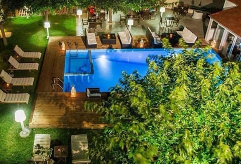 Outdoor pool, open 8:30 AM to 6 PM, pool umbrellas, sun loungers