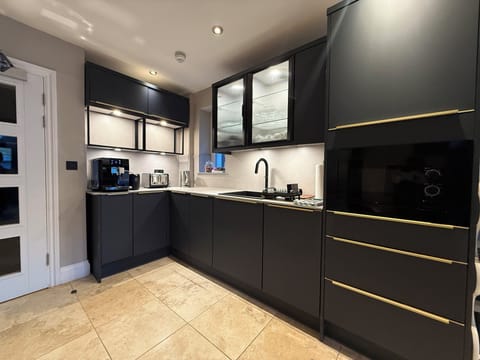 Shared fridge, microwave, coffee/tea maker, electric kettle