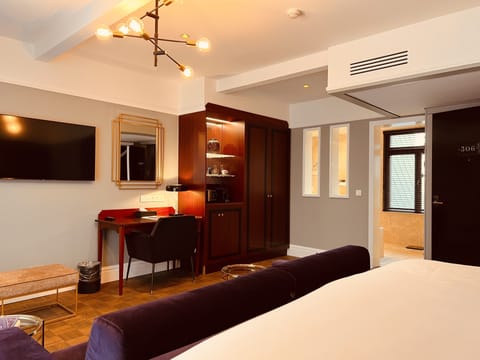 Premium bedding, down comforters, Tempur-Pedic beds, free minibar