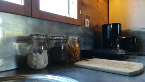 Full-size fridge, microwave, stovetop, coffee/tea maker