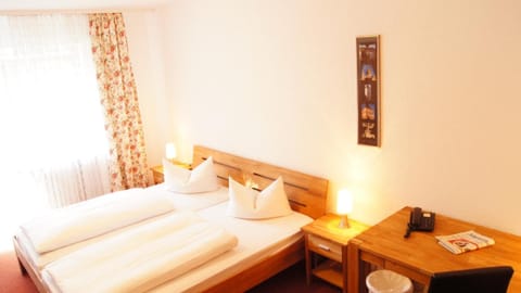 Desk, free WiFi, bed sheets