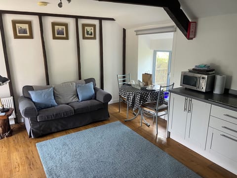 Cottage | Living area | TV, fireplace