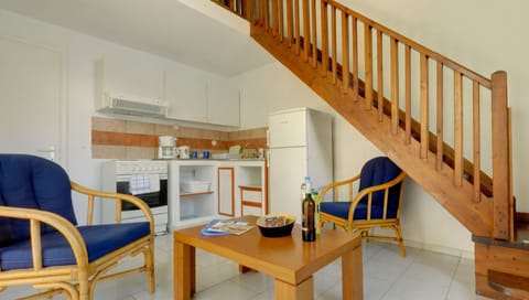 Duplex, 1 Bedroom, Mezzanine (Type C) | Living area | 32-inch flat-screen TV with satellite channels, TV