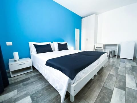 Basic Room (Paris) | Minibar, desk, WiFi (free), bed sheets