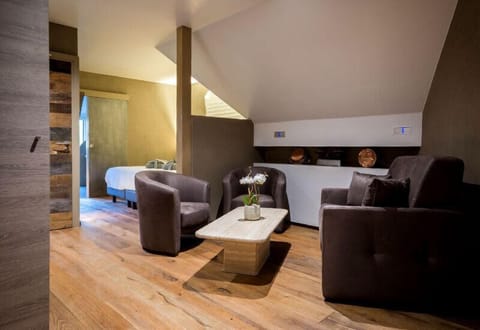 Junior Suite, 1 King Bed, Non Smoking | Living area | TV