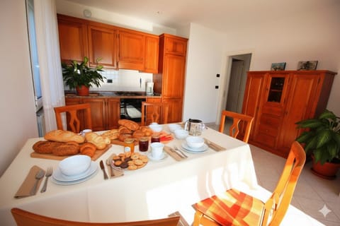 Apartment, 2 Bedrooms | Private kitchen | Full-size fridge, oven, stovetop, cookware/dishes/utensils