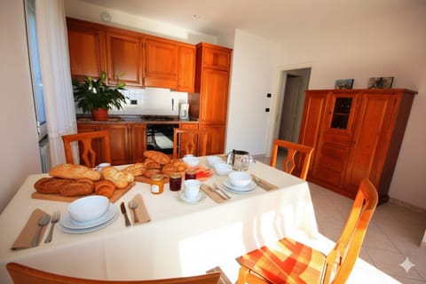 Apartment, 2 Bedrooms | Private kitchen | Full-size fridge, oven, stovetop, cookware/dishes/utensils