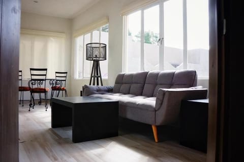 Deluxe Apartment, 2 Bedrooms, Non Smoking | Living room | 32-inch Smart TV with cable channels, TV, Netflix