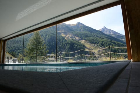 Indoor pool, open 2:30 PM to 8 PM, sun loungers